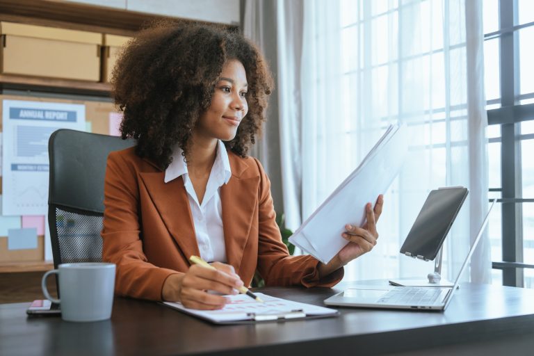 Working,Smart,,African,American,Business,Woman,Working,Audit,Balance,Sheet,